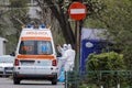Romanian medical personnel wearing protective suits in the yard of a hospital closed for Covid-19 infection