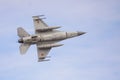 A Romanian military jet pilot flies his F16 Falcon during a demonstration following the opening ceremony for the European F-16