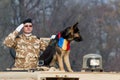 Romanian national day parade with canine unit and military salute Royalty Free Stock Photo