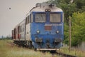Romanian CFR old commuter train with a blue locomotive