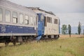 Romanian CFR old commuter train with a blue locomotive