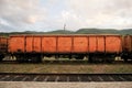 Romanian orange EACS type freight train car