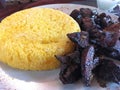 In Romanian, Pastrama de oaie smoked sheep meat and then barbecue and in Romanian also, mamaliga polenta in a restaurant in Ar