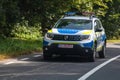 Romanian Police new Dacia Duster car in motion on asphalt road, front view of police car in Arges, Romania, 2020