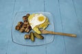 Romanian traditional food, fried sausages, soft egg and "mamaliga