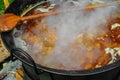 Romanian traditional food prepared at the cauldron on the open fire Royalty Free Stock Photo