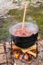 Romanian traditional food prepared at the cauldron on the open fire Royalty Free Stock Photo