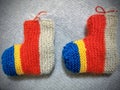 Romanian traditional hand knitted baby socks made of soft wool Royalty Free Stock Photo