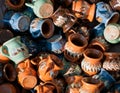 Romanian traditional pottery handcrafted mugs at a souvenir shop. Romanian traditional handcrafted pottery Royalty Free Stock Photo