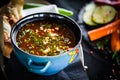 Romanian traditional turkey soup with fresh vegetables, wipe cream, spices & home made bread