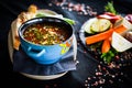 Romanian traditional turkey soup with fresh vegetables, wipe cream, spices & home made bread