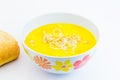 Romanian tripe soup in a white bowl with flowers isolated Royalty Free Stock Photo