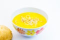 Romanian tripe soup in a white bowl with flowers isolated Royalty Free Stock Photo