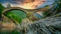 The romanic historic bridge Ponte Dei Salti Bridge in Lavertezzo, Verzasca Valley, ticino, Switzerland. Travel concept. Royalty Free Stock Photo