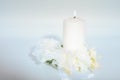 Romanti candle with white flowers Royalty Free Stock Photo