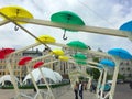 Romantic alley of colorful umbrellas