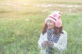 Romantic Asian beautiful girl walking in a field in sunset light. Winter, autumn life Royalty Free Stock Photo