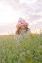 Romantic Asian beautiful girl walking in a field in sunset light. Winter, autumn life Royalty Free Stock Photo