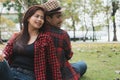 Romantic asian couple dating in the park Royalty Free Stock Photo