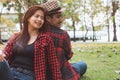 Romantic asian couple dating in the park Royalty Free Stock Photo