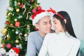Romantic couple in love feeling,spending time on christmas eve together, woman and man enjoying perfect relationships