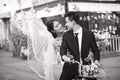 Romantic asian newly-wed riding a bicycle Royalty Free Stock Photo