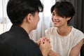 Romantic asian young gay men couple holding their hands together. LGBT love affection Royalty Free Stock Photo