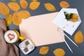 Romantic autumn mock-up. Sheet of beige paper, white envelope wi