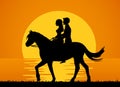 Romantic background with couple riding horse on the beach at sunset silhouette