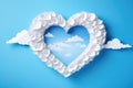 Romantic balloon heart design set against a soft blue sky background. The expressive paper cut heart symbolizes love and joy,