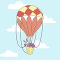 Romantic balloon ride with a basket of flowers and a plush hare