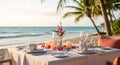 Romantic Beach Dinner Table Setting at Sunset with Palm Trees image photo Royalty Free Stock Photo