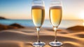 Romantic beach evening on sunset with two glasses of champagne standing on sand Royalty Free Stock Photo