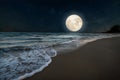 Romantic beach and full moon with star. Royalty Free Stock Photo