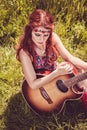 Romantic beautiful girl with her guitar Royalty Free Stock Photo