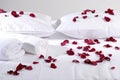 Romantic Beautiful red Petals on white cushions wi Royalty Free Stock Photo