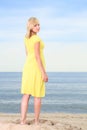 Romantic Beautiful smiling girl yellow dress