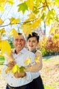 Romantic Beautiful young couple walking in autumn park Royalty Free Stock Photo