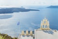 Romantic belfry of the orthodox church above the mediterranean sea. Santorini ( Thira ) island