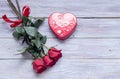 Romantic bouquet of red roses and box with candies Royalty Free Stock Photo