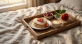 Romantic Breakfast in Bed With Pancakes, Berry Bowl, Latte, Rose, and Tray Setup Royalty Free Stock Photo