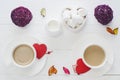 Romantic breakfast with couple white cups of coffee on white Royalty Free Stock Photo