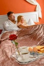 Romantic breakfast hotel room service young couple