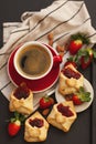 Romantic breakfast for valentine's day: coffee, love letter cookies, strawberry jam, fresh strawberries and Royalty Free Stock Photo