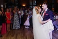 Romantic bride and groom dancing and holding hands at wedding re Royalty Free Stock Photo