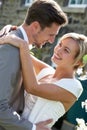 Romantic Bride And Groom Embracing Outdoors Royalty Free Stock Photo