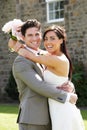 Romantic Bride And Groom Embracing Outdoors Royalty Free Stock Photo