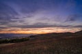 Romantic, bright and colorful sunset over a mountain range in Transilvania Royalty Free Stock Photo