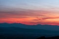 Romantic, bright and colorful sunset over a mountain range in Transilvania Royalty Free Stock Photo