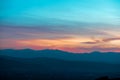 Romantic, bright and colorful sunset over a mountain range in Transilvania Royalty Free Stock Photo